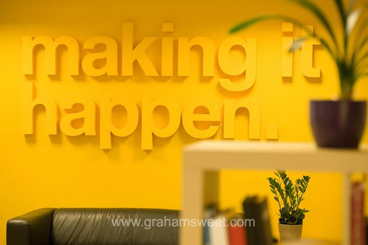 Wall-mounted Making It Happen letters